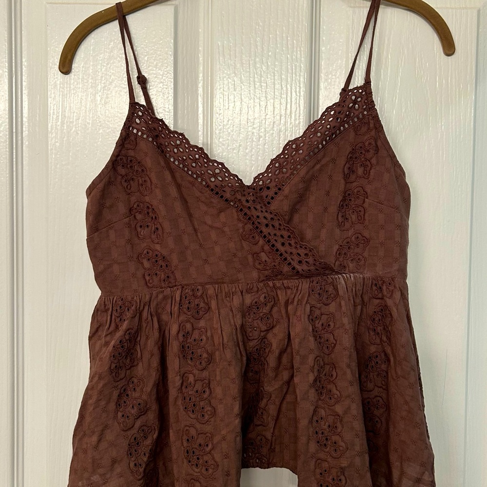 American Eagle cute lacey crop top, spaghetti straps and flairs at the bottom.